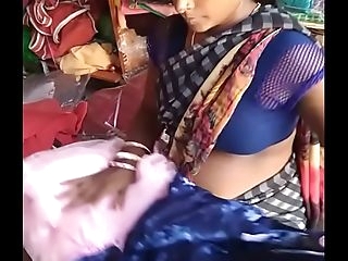 desi super-sexy dark-hued aunty in saree shop